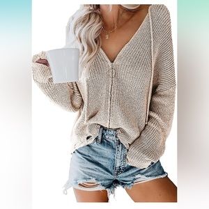 Cozy cream colored hooded raw hem zip up sweater